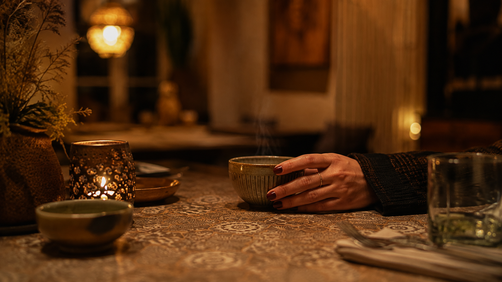 A quiet moment at the table in the warm AgniFood interior